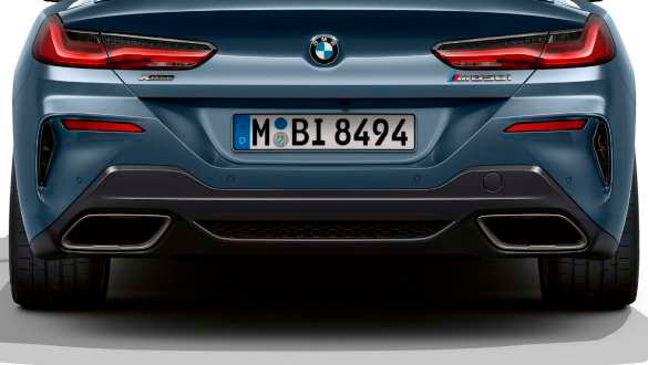 Випускні труби з обох сторін.